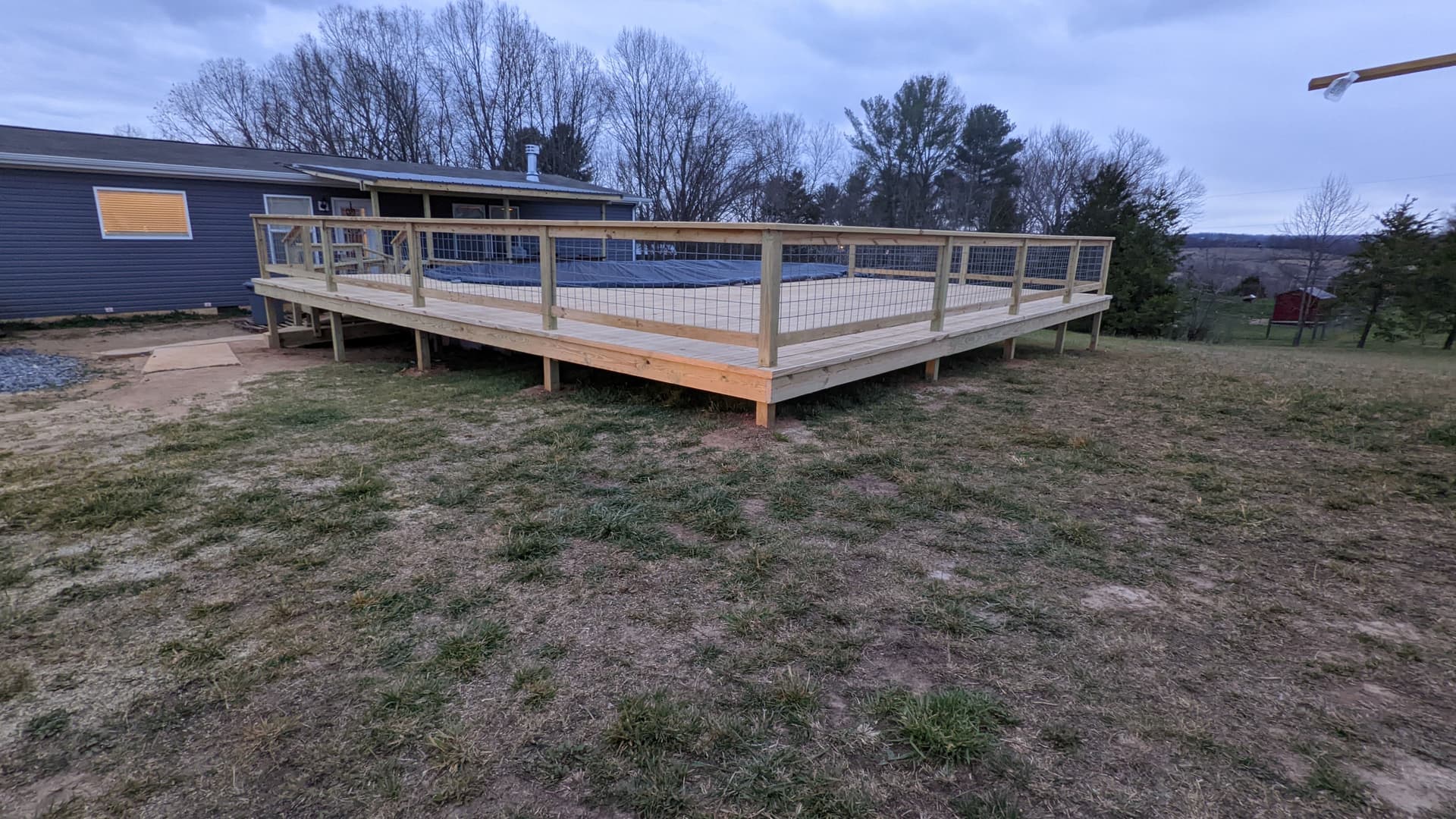 Gallery photos for Custom Pool Deck Build with Stairs, Landing, and Wire Railing: Image #9