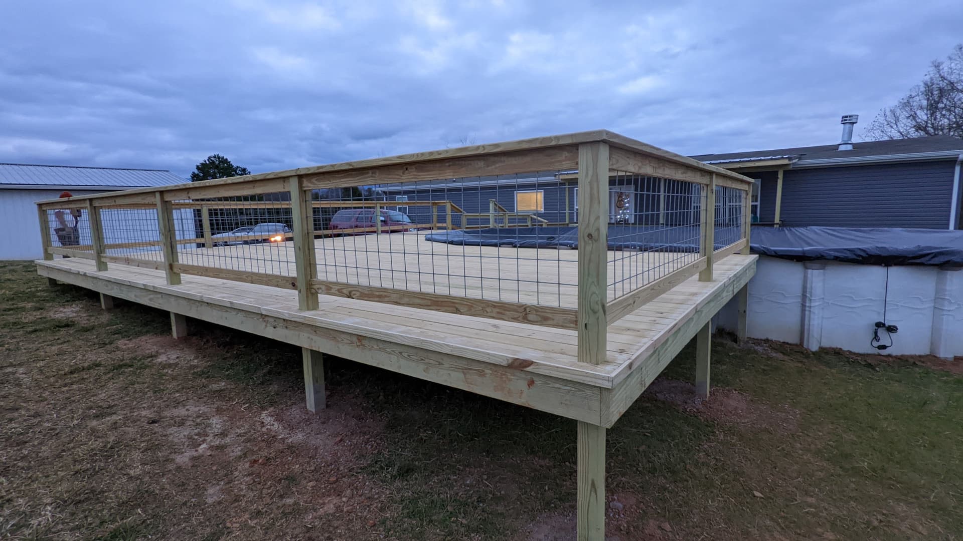 Gallery photos for Custom Pool Deck Build with Stairs, Landing, and Wire Railing: Image #8